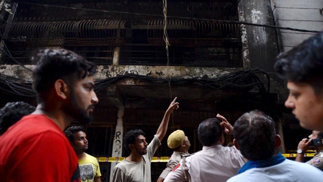 At least six people were killed and 11 injured after a fire broke out in a multi-storey building in southeast Delhi’s Zakir Nagar (HT Photo/Burhaan) At least six people were killed and 11 injured after a fire broke out in a multi-storey building in southeast Delhi’s Zakir Nagar (HT Photo/Burhaan)