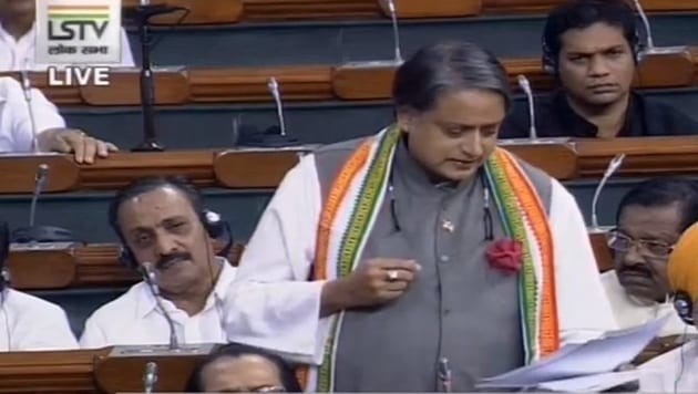 Congress MP Shashi Tharoor during his speech in the Lok Sabha during the debate on revoking Article 370. (LSTV) Congress MP Shashi Tharoor during his speech in the Lok Sabha during the debate on revoking Article 370. (LSTV)