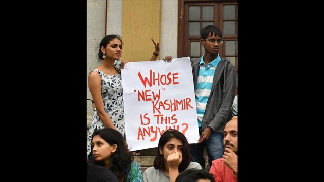 Protestors and activists belonging to the Alternative Law Forum and other left wing organisations take part in a protest in Bangalore in reaction to the Indian government scrapping Article 370 that granted a special status to Jammu and Kashmir. (Manjunath Kiran / AFP) Protestors and activists belonging to the Alternative Law Forum and other left wing organisations take part in a protest in Bangalore in reaction to the Indian government scrapping Article 370 that granted a special status to Jammu and Kashmir. (Manjunath Kiran / AFP)