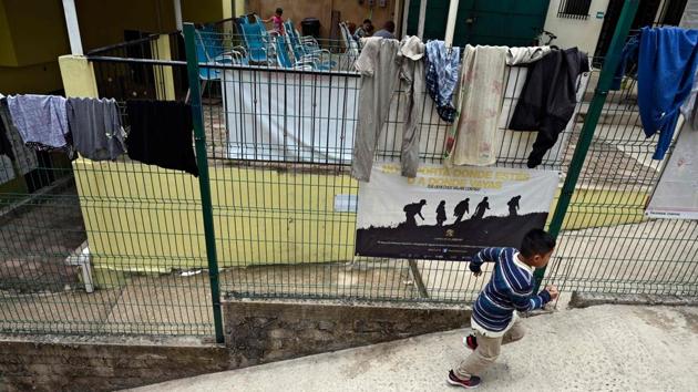 A migrant child plays at La Casa del Caminante shelter. Mexico’s government insists that its new migration measures are designed to treat undocumented travelers with dignity, looking after their integrity and human rights. (Alfredo Estrella / AFP) A migrant child plays at La Casa del Caminante shelter. Mexico’s government insists that its new migration measures are designed to treat undocumented travelers with dignity, looking after their integrity and human rights. (Alfredo Estrella / AFP)