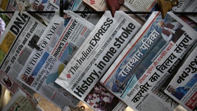 Newspapers, with headlines about Prime Minister Narendra Modi’s decision to revoke special status for the Kashmir region, are displayed for sale at a pavement in Ahmedabad, Gujarat. The decision soon became a national debate with opinion coming in from movie stars to sport personalities. Nothing has come from Kashmiri locals and politicians due to the communication blackout in the state. (Amit Dave / REUTERS) Newspapers, with headlines about Prime Minister Narendra Modi’s decision to revoke special status for the Kashmir region, are displayed for sale at a pavement in Ahmedabad, Gujarat. The decision soon became a national debate with opinion coming in from movie stars to sport personalities. Nothing has come from Kashmiri locals and politicians due to the communication blackout in the state. (Amit Dave / REUTERS)