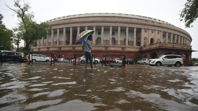 Water logging after rain seen at Parliament House premises, in New Delhi. The national weather forecaster sees the present trend holding at least till Friday, August 9, with generally cloudy skies and possibility of rain or thunderstorm. (Sonu Mehta / HT Photo) 