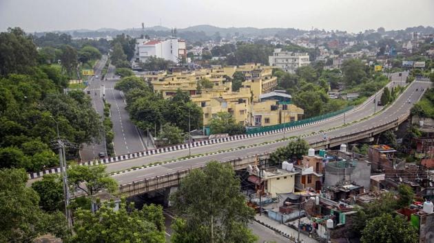 A view of a deserted flyover during restrictions in Jammu. Restrictions and night curfews were imposed in several districts of Jammu and Kashmir in view of the reorganisation bill in Parliament. (PTI) A view of a deserted flyover during restrictions in Jammu. Restrictions and night curfews were imposed in several districts of Jammu and Kashmir in view of the reorganisation bill in Parliament. (PTI)
