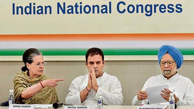 UPA chairperson Sonia Gandhi (left), Congress leader Rahul Gandhi (centre), former PM Manmohan Singh during a Congress Working Committee meeting at AICC headquarters on Tuesday.(Sanjeev Verma/HT)