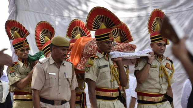 The last rites of the 67-year-old BJP stalwart were performed by her daughter Bansuri Swaraj, as her husband Swaraj Kaushal stood beside her. (Photo by Sanjeev Verma/HT Photo) The last rites of the 67-year-old BJP stalwart were performed by her daughter Bansuri Swaraj, as her husband Swaraj Kaushal stood beside her. (Photo by Sanjeev Verma/HT Photo)