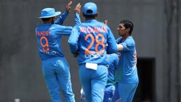 Navdeep Saini celebrates after taking a wicket during the match between West Indies and India. (Twitter)