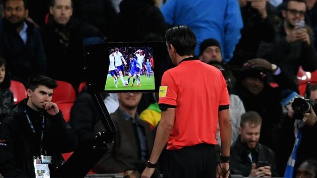 Referee Deniz Aytekin checks the VAR during an International friendly between England and Italy.(Getty Images)