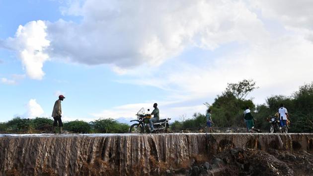 Met officials predicted more rain in Malkangiri district, policemen are keeping a watch over several bridges in the district. (AFP Photo/Representative) Met officials predicted more rain in Malkangiri district, policemen are keeping a watch over several bridges in the district. (AFP Photo/Representative)