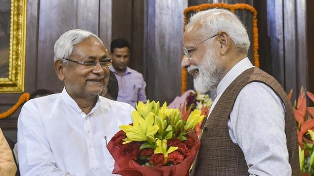 Prime Minister Narendra Modi being greeted by Chief Minister of Bihar Nitish Kumar in Parliament House(PTI File)