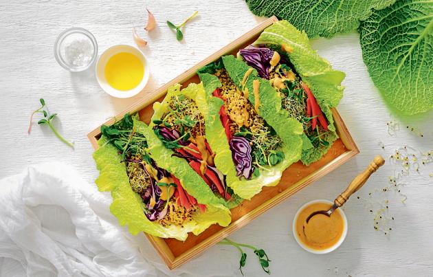 Vegan detox spring rolls with quinoa, sprouts and Thai peanut sauce, view from above, flat lay(Getty Images/iStockphoto)