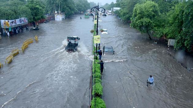 Vehicles wade through a flooded street after heavy rainfall at Tonk Road in Jaipur on Tuesday, August 6, 2019. (ANI) Vehicles wade through a flooded street after heavy rainfall at Tonk Road in Jaipur on Tuesday, August 6, 2019. (ANI)