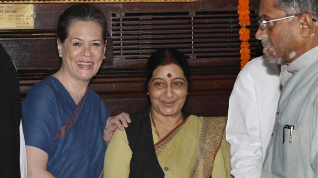 Congress leader Sonia Gandhi and then Union External Affairs Minister Sushma Swaraj during former Prime Minister Rajiv Gandhi’s birth anniversary, at Parliament House, on August 20, 2014. She began her political career with Akhil Bharatiya Vidyarthi Parishad in the 1970s. Her husband, Swaraj Kaushal, was closely associated with the socialist leader George Fernandes and Swaraj became a part of George Fernandes’s legal defence team in 1975. After the Emergency, she joined the Bharatiya Janata Party. (Arvind Yadav / HT Archive)