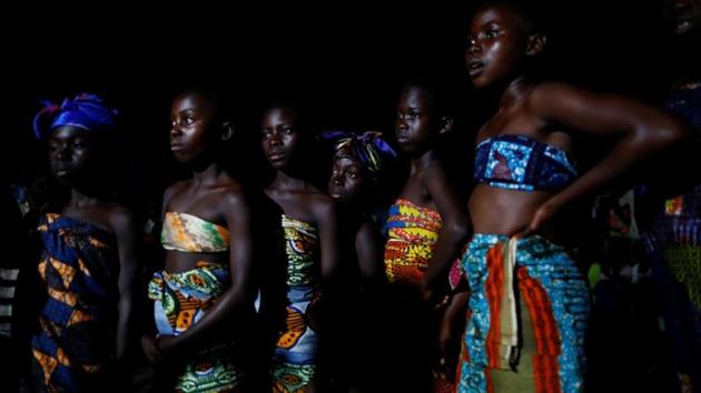 Children dressed in traditional style cloth wrappings perform for residents of Kofi Gyan during a cultural performance, in a village on Tarkwa-Bogoso road, in Kofi Gyan. This month marks 400 years since the first recorded African slaves arrived in North America to work plantations in English colonies. (Francis Kokoroko / REUTERS) Children dressed in traditional style cloth wrappings perform for residents of Kofi Gyan during a cultural performance, in a village on Tarkwa-Bogoso road, in Kofi Gyan. This month marks 400 years since the first recorded African slaves arrived in North America to work plantations in English colonies. (Francis Kokoroko / REUTERS)