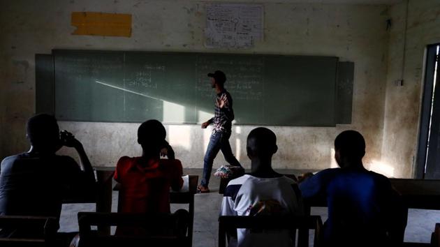 Boys take extra lessons after school hours in Obuasi. European slave traders shipped millions of African men, women and children across the Atlantic Ocean centuries after the first recorded African slaves arrived in North America. Many died in horrific conditions on the slave boats, while survivors endured a life of misery and back-breaking farm work. (Francis Kokoroko / REUTERS) Boys take extra lessons after school hours in Obuasi. European slave traders shipped millions of African men, women and children across the Atlantic Ocean centuries after the first recorded African slaves arrived in North America. Many died in horrific conditions on the slave boats, while survivors endured a life of misery and back-breaking farm work. (Francis Kokoroko / REUTERS)