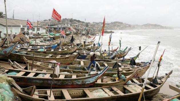 British and American flags are among other flags hoisted on fishermen’s boats at the Cape Coast Castle. From the castles, where European authorities lived in comfort right above the dungeons that held the slaves, the captured Africans walked through the Door of No Return onto the ships that would take them to America. (Siphiwe Sibeko / REUTERS) British and American flags are among other flags hoisted on fishermen’s boats at the Cape Coast Castle. From the castles, where European authorities lived in comfort right above the dungeons that held the slaves, the captured Africans walked through the Door of No Return onto the ships that would take them to America. (Siphiwe Sibeko / REUTERS)