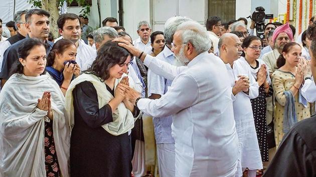 PM Narendra Modi consoles Bansuri Swaraj, the daughter of Sushma Swaraj, in New Delhi on Wednesday.(PTI image)