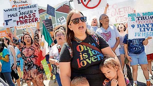 Protestors demonstrating against President Donald Trump.(AP Photo) Protestors demonstrating against President Donald Trump.(AP Photo)