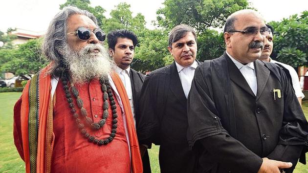 Hindu Mahasabha lawyer Barun Kumar Sinha outside Supreme Court after the Ayodhya land dispute case hearing in New Delhi on August 2.(Sonu Mehta/HT Photo) Hindu Mahasabha lawyer Barun Kumar Sinha outside Supreme Court after the Ayodhya land dispute case hearing in New Delhi on August 2.(Sonu Mehta/HT Photo)