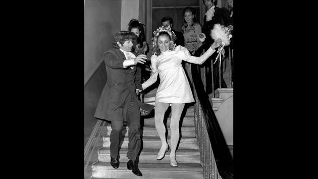 In this file photo, American actress Sharon Tate and Polish born film director Roman Polanski skip downstairs after their wedding at Chelsea Register Office in London, on January 20, 1968. As a tour guide specializing in notorious Hollywood deaths, Scott Michaels is well aware of America’s morbid fascination with the dark side of Tinseltown. (Eddie Worth / AP File) In this file photo, American actress Sharon Tate and Polish born film director Roman Polanski skip downstairs after their wedding at Chelsea Register Office in London, on January 20, 1968. As a tour guide specializing in notorious Hollywood deaths, Scott Michaels is well aware of America’s morbid fascination with the dark side of Tinseltown. (Eddie Worth / AP File)