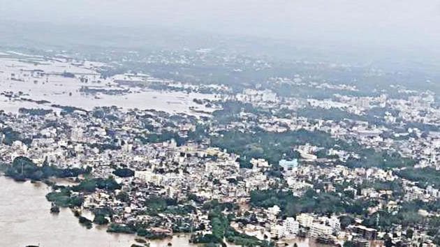 Flooded areas of Kolhapur, Sangli & Satara seen from air. (ANI Photo) Flooded areas of Kolhapur, Sangli & Satara seen from air. (ANI Photo)