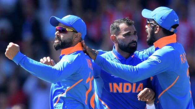 File image of Virat Kohli celebrating the fall of a wicket with Mohammed Shami and KL Rahul (L-R). (AFP) File image of Virat Kohli celebrating the fall of a wicket with Mohammed Shami and KL Rahul (L-R). (AFP)