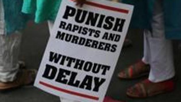 The fast track court in Telangana’s Warangal completed the hearing of the case of raping and murdering a nine-month-old baby in June this year in just 48 days from the day of the incident. The judge examined 30 witnesses. In this April 15, 2018 file photo, an Indian protestor stands with a placard during a protest against two recently reported rape cases as they gather near the Indian parliament in New Delhi, India. (AP) The fast track court in Telangana’s Warangal completed the hearing of the case of raping and murdering a nine-month-old baby in June this year in just 48 days from the day of the incident. The judge examined 30 witnesses. In this April 15, 2018 file photo, an Indian protestor stands with a placard during a protest against two recently reported rape cases as they gather near the Indian parliament in New Delhi, India. (AP)
