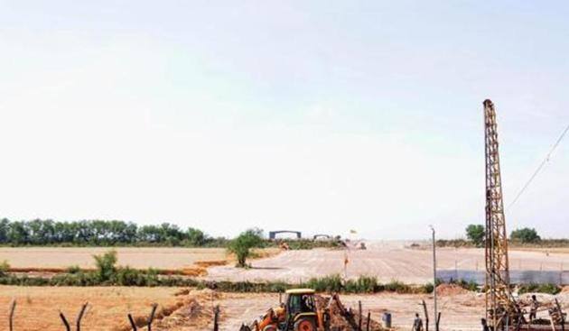 Work beyond the border fence for the construction of the Indian side of Kartarpur corridor.(PTI Photo) Work beyond the border fence for the construction of the Indian side of Kartarpur corridor.(PTI Photo)
