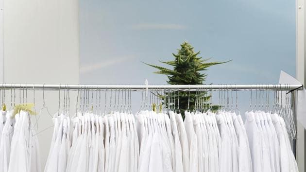 Lab coats hang on a rack at a WeedMD Inc. cannabis growing facility. Earlier opposition was “propaganda,” said Jeannette VanderMarel, co-CEO of 48North Cannabis Corp., which received one of the first outdoor cultivation licenses for a farm in Brant County, Ontario, with a potential capacity of 40,000 kilograms. The company also has a small indoor cultivation facility and a processing and manufacturing plant. (Cole Burston / Bloomberg) Lab coats hang on a rack at a WeedMD Inc. cannabis growing facility. Earlier opposition was “propaganda,” said Jeannette VanderMarel, co-CEO of 48North Cannabis Corp., which received one of the first outdoor cultivation licenses for a farm in Brant County, Ontario, with a potential capacity of 40,000 kilograms. The company also has a small indoor cultivation facility and a processing and manufacturing plant. (Cole Burston / Bloomberg)