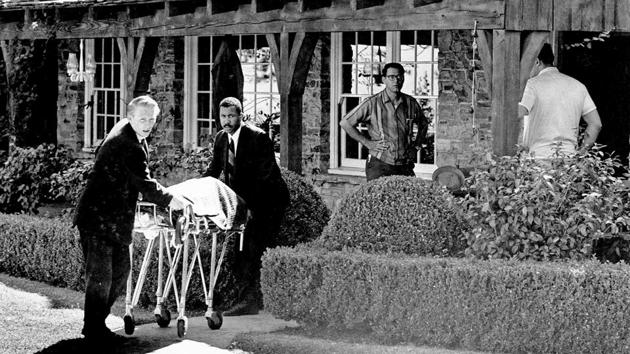 The body of actress Sharon Tate is taken from her rented house on Cielo Drive in the Bel-Air area of Los Angeles, on August 09, 1969. Michaels drives his customers up to Cielo Drive, the leafy and winding road above exclusive Beverly Hills. One of those customers last year was director Quentin Tarantino, undertaking research for his new hit movie “Once Upon a Time in Hollywood” which takes the killings as its backdrop. (AP File) The body of actress Sharon Tate is taken from her rented house on Cielo Drive in the Bel-Air area of Los Angeles, on August 09, 1969. Michaels drives his customers up to Cielo Drive, the leafy and winding road above exclusive Beverly Hills. One of those customers last year was director Quentin Tarantino, undertaking research for his new hit movie “Once Upon a Time in Hollywood” which takes the killings as its backdrop. (AP File)