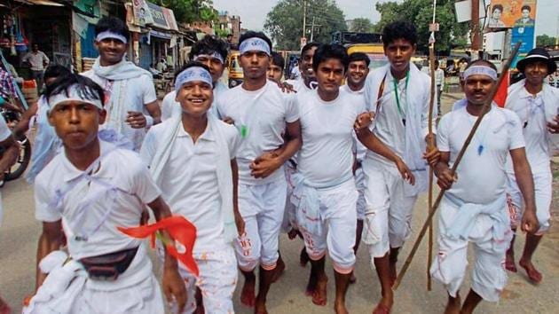 Dak Bams in Prayagraj on way to Kashi Vishwanath temple in Varanasi. The month-long pilgrimage ends on August 15.(HT Photo) Dak Bams in Prayagraj on way to Kashi Vishwanath temple in Varanasi. The month-long pilgrimage ends on August 15.(HT Photo)