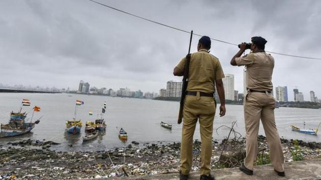 A police commando stands guard by the sea coast at Geeta Nagar, Colaba, after a high alert was issued in Mumbai, on September 23, 2016. (HT file photo for representation) A police commando stands guard by the sea coast at Geeta Nagar, Colaba, after a high alert was issued in Mumbai, on September 23, 2016. (HT file photo for representation)