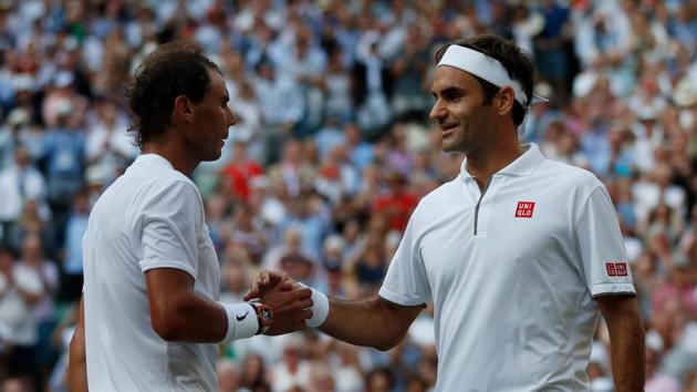 Roger Federer with Rafael Nadal at Wimbledon. (AFP) Roger Federer with Rafael Nadal at Wimbledon. (AFP)