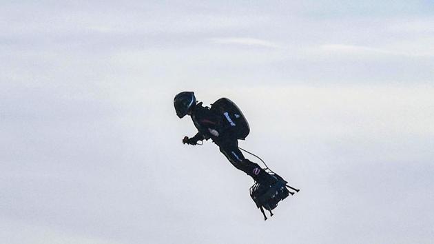 Franky Zapata stands on his jet-powered "flyboard" after he took off from Sangatte, northern France, in an attempt to fly across the 35-kilometre (22-mile) Channel crossing in 20 minutes, while keeping an average speed of 140 kilometre an hour (87 mph) at a height of 15-20 metres (50-65 feet) above the sea. (Denis Charlet / AFP)