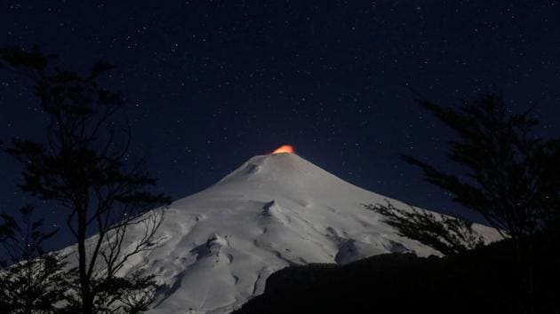 The Villarrica Volcano is seen at night from Pucon town, Chile. (Cristobal Saavedra / REUTERS)