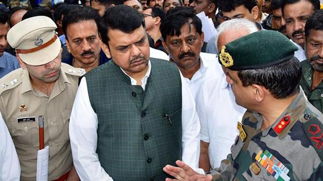 Maharashtra CM takes stock of Sangli floods. (PTI) Maharashtra CM takes stock of Sangli floods. (PTI)