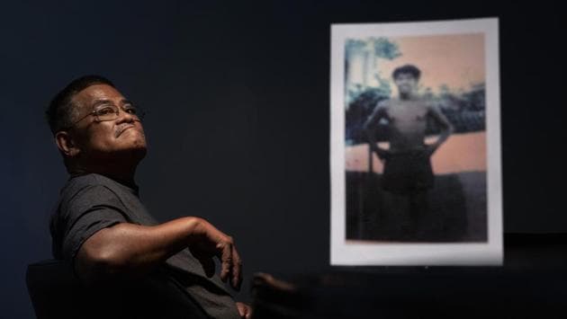 Anthony Vegafria, 59, sits behind a photo of himself when he was 13 years old, the age when he says in a lawsuit he was sexually abused by Louis Brouillard, a Catholic priest and scoutmaster for the Boy Scouts of America. “Sometimes I don’t really want to think about it,” said Vegafria of the abuse. (David Goldman / AP) Anthony Vegafria, 59, sits behind a photo of himself when he was 13 years old, the age when he says in a lawsuit he was sexually abused by Louis Brouillard, a Catholic priest and scoutmaster for the Boy Scouts of America. “Sometimes I don’t really want to think about it,” said Vegafria of the abuse. (David Goldman / AP)