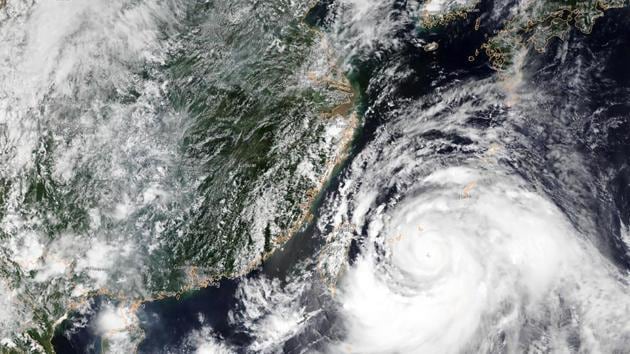 This satellite image obtained today shows Typhoon Lekima approaching southeastern China. The deaths were caused by a landslide triggered by the storm’s downpours in the municipality of Wenzhou, around 400 kilometres (250 miles) south of Shanghai, national television station CCTV reported. “Torrential rains caused a landslide on a mountain that blocked a river below,” it said, adding that the resulting “dam” created a lake which swept downstream when it burst. (NOAA / AFP)