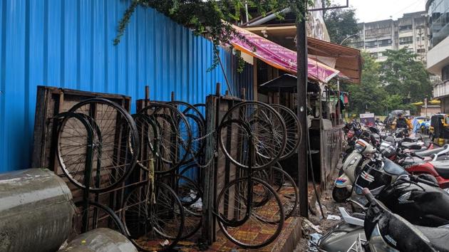 Camp resident says the footpath on Taboot street is used up by restaurant and handcarts. (Sanket Wankhade/HT PHOTO) Camp resident says the footpath on Taboot street is used up by restaurant and handcarts. (Sanket Wankhade/HT PHOTO)