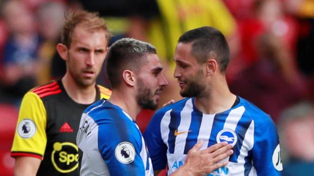 Brighton and Hove Albion's Neal Maupay celebrates after the match with Florin Andone as Watford's Craig Dawson looks dejected.(Action Images via Reuters)