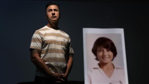 Walter Denton, 55, stands behind a photo of himself when he was about 12 years old, in Hagatna. Denton says he was raped at age 13 by then-Archbishop of Agana, Anthony Apuron. “This whole thing changed my whole life,” said Denton. “He took everything from me. From that day forward my demeanour changed. I break down, I hurt everyday and I still hurt. It’s something that I’ll never get over.” (David Goldman / AP) Walter Denton, 55, stands behind a photo of himself when he was about 12 years old, in Hagatna. Denton says he was raped at age 13 by then-Archbishop of Agana, Anthony Apuron. “This whole thing changed my whole life,” said Denton. “He took everything from me. From that day forward my demeanour changed. I break down, I hurt everyday and I still hurt. It’s something that I’ll never get over.” (David Goldman / AP)