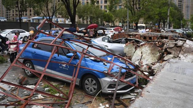 Cars are damaged after Typhoon Lekima made landfall in Wenling, Zhejiang province. More than a million people were evacuated from their homes ahead of the storm, the official Xinhua news agency reported. Some 110,000 people were housed in shelters. (REUTERS)