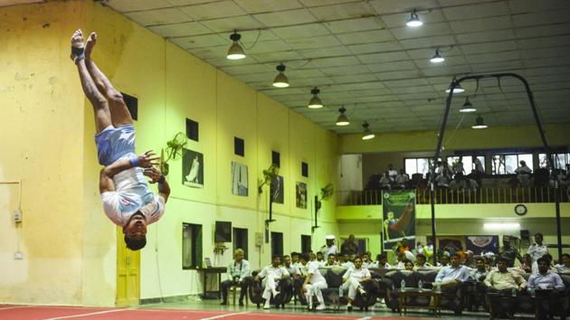 Athletes perform during 46th Inter Service Gymnastics Championship was inaugurated at INS Hamla,Marve Malad in Mumbai. (Pramod Thakur / HT Photo) Athletes perform during 46th Inter Service Gymnastics Championship was inaugurated at INS Hamla,Marve Malad in Mumbai. (Pramod Thakur / HT Photo)