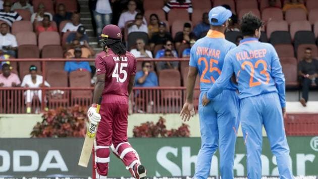 India's bowler Kuldeep Yadav, right and Shikhar Dhawan(AP)