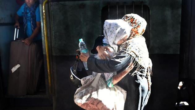 A passenger breaks down as she arrives at Old Delhi Railway station, in New Delhi, India, on Friday, August 9, 2019. The Samjhauta Express which was stopped at the Wagah border by Pakistani authorities on Thursday reached Old Delhi railway station with 117 passengers at 8:05 am on Friday, four-and-a-half hours behind schedule, the railways said. (Sushil Kumar / HT Photo) A passenger breaks down as she arrives at Old Delhi Railway station, in New Delhi, India, on Friday, August 9, 2019. The Samjhauta Express which was stopped at the Wagah border by Pakistani authorities on Thursday reached Old Delhi railway station with 117 passengers at 8:05 am on Friday, four-and-a-half hours behind schedule, the railways said. (Sushil Kumar / HT Photo)