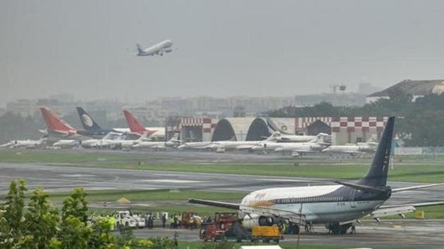 The two pilots operating SpiceJet’s Coimbatore-Mumbai flight, which overshot Mumbai airport’s secondary runway on July 2, have been suspended for a year by aviation regulator, the Directorate General of Civil Aviation(PTI)