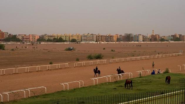 Men ride horses on the race track at the Equestrian Club compound in Khartoum. Horse races were halted and attendance at equestrian classes dwindled after protests broke out in the dusty streets of Khartoum, with the loss of scores of lives as security forces cracked down. (Andreea Campeanu / REUTERS) Men ride horses on the race track at the Equestrian Club compound in Khartoum. Horse races were halted and attendance at equestrian classes dwindled after protests broke out in the dusty streets of Khartoum, with the loss of scores of lives as security forces cracked down. (Andreea Campeanu / REUTERS)
