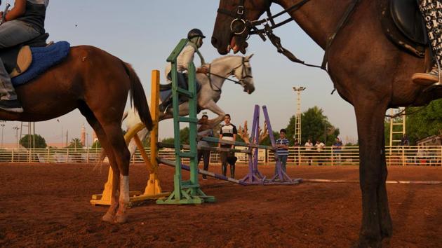 Sudanese horse riders take part in a class at the Equestrian Club in Khartoum. “The main problem is that people don’t have enough cash (for the club), they’re keeping it to live on, not to bring children to ride horses,” said Rafat Awad, the club’s treasurer. “You see the situation in our country, people dying. You can’t just go and race. Some people are sad, some are angry, some still waging revolution, so we found it wasn’t right to stage competitions.” (Andreea Campeanu / REUTERS) Sudanese horse riders take part in a class at the Equestrian Club in Khartoum. “The main problem is that people don’t have enough cash (for the club), they’re keeping it to live on, not to bring children to ride horses,” said Rafat Awad, the club’s treasurer. “You see the situation in our country, people dying. You can’t just go and race. Some people are sad, some are angry, some still waging revolution, so we found it wasn’t right to stage competitions.” (Andreea Campeanu / REUTERS)
