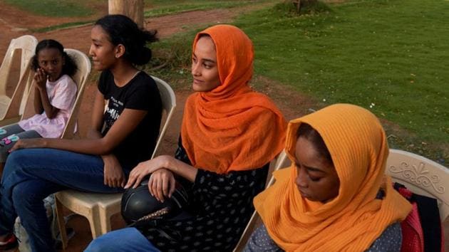 Einas (R), 18, and her friends wait to ride horses at the Equestrian Club in Khartoum. Some female club members describe how they’ve had to overcome disapproval of women participating in sport widespread in strictly Islamic Sudan. “If your family members are interested, it’s easier than if you start on your own,” said Einas, 18, who has been riding for one year. Her father has race horses and has won competitions. She said that in Sudan, however, racing was mainly a man’s sport while women often practiced show-jumping. (Andreea Campeanu / REUTERS) Einas (R), 18, and her friends wait to ride horses at the Equestrian Club in Khartoum. Some female club members describe how they’ve had to overcome disapproval of women participating in sport widespread in strictly Islamic Sudan. “If your family members are interested, it’s easier than if you start on your own,” said Einas, 18, who has been riding for one year. Her father has race horses and has won competitions. She said that in Sudan, however, racing was mainly a man’s sport while women often practiced show-jumping. (Andreea Campeanu / REUTERS)