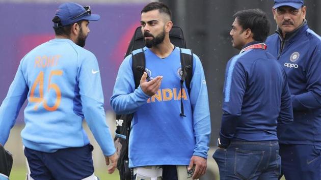 Indian cricket chief selector MSK Prasad, second right, and coach Ravi Shastri, right, listen as India's captain Virat Kohli, second left, talks to teammate Rohit Sharma after batting in the nets during a training session during the recently concluded Cricket World Cup, 2019. (AP) Indian cricket chief selector MSK Prasad, second right, and coach Ravi Shastri, right, listen as India's captain Virat Kohli, second left, talks to teammate Rohit Sharma after batting in the nets during a training session during the recently concluded Cricket World Cup, 2019. (AP)