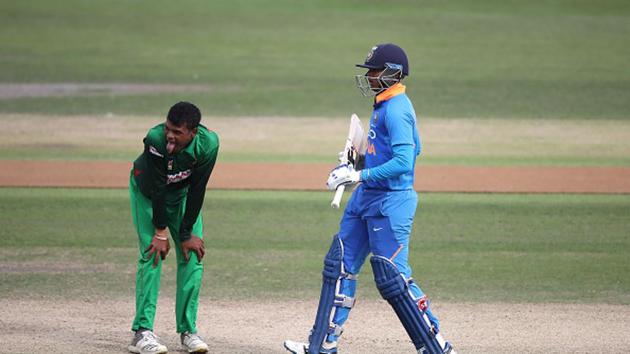 Rakibul Hasan of Bangladesh sticks his tongue out as Divyansh Saxena of India scores more runs. (Getty Images) Rakibul Hasan of Bangladesh sticks his tongue out as Divyansh Saxena of India scores more runs. (Getty Images)
